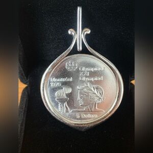 Canada $5 Silver Coin. Montreal XXI Summer Olympic Games 
Athlete With Torch